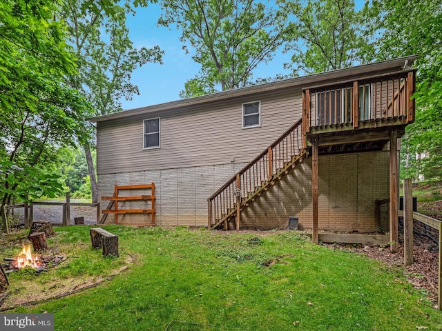 237 Lakeview Dr, Cross Junction, VA 22625 - back of property with a fire pit, stairs, and a deck