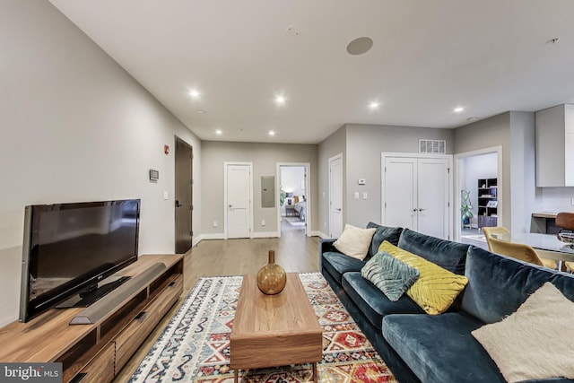625 Park Rd NW Unit 206, Washington, DC 20010 - living room featuring light wood-style flooring, recessed lighting, and electric panel