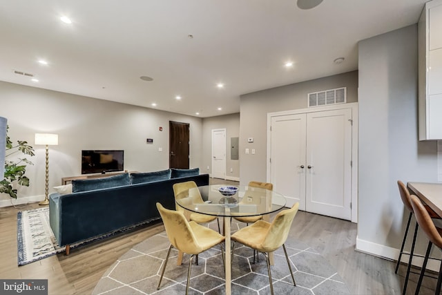 625 Park Rd NW Unit 206, Washington, DC 20010 - dining room with light wood-style floors and recessed lighting