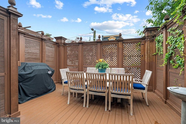 2116 Green St, Philadelphia, PA 19130 - wooden deck with grilling area and outdoor dining area