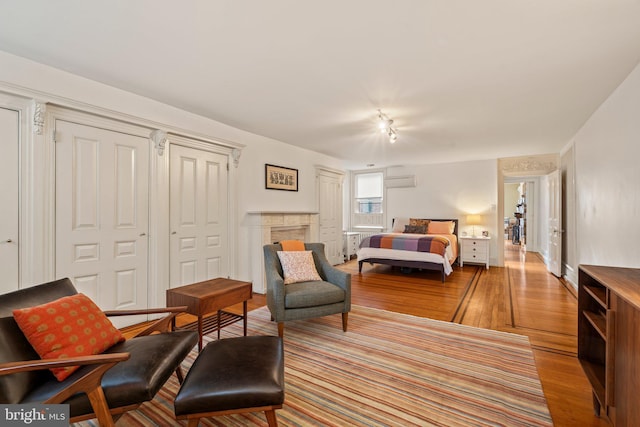 2116 Green St, Philadelphia, PA 19130 - bedroom featuring wood finished floors and a fireplace