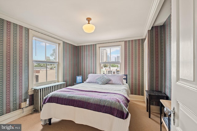 2116 Green St, Philadelphia, PA 19130 - bedroom with radiator heating unit, crown molding, carpet flooring, and wallpapered walls