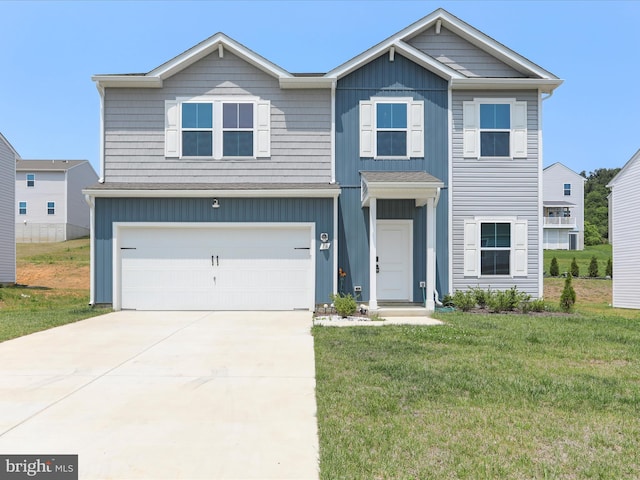 76 Diving Scaup Rd, Hedgesville, WV 25427 - view of front of home with a front lawn, a garage, driveway, and board and batten siding