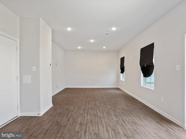 76 Diving Scaup Rd, Hedgesville, WV 25427 - spare room with wood finished floors and recessed lighting