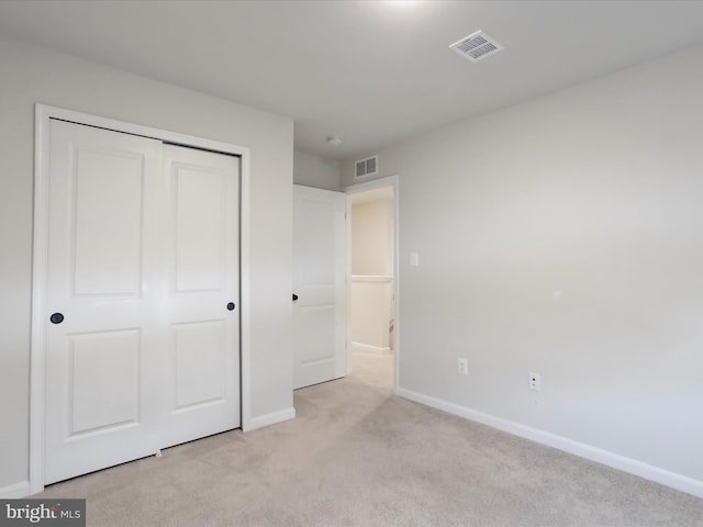 76 Diving Scaup Rd, Hedgesville, WV 25427 - unfurnished bedroom with light colored carpet and a closet