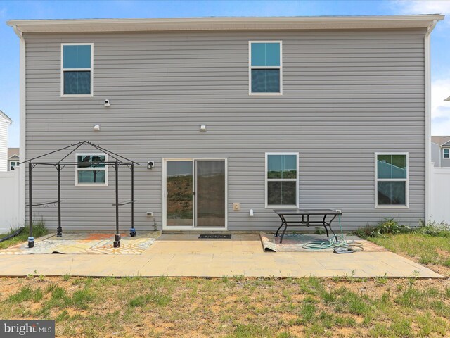 76 Diving Scaup Rd, Hedgesville, WV 25427 - back of property featuring a patio area