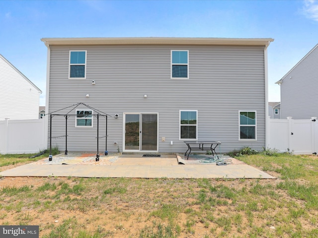 76 Diving Scaup Rd, Hedgesville, WV 25427 - back of house with a patio area and a fenced backyard