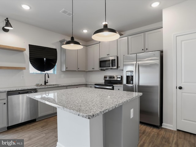 76 Diving Scaup Rd, Hedgesville, WV 25427 - kitchen featuring stainless steel appliances, gray cabinetry, open shelves, a kitchen island, and dark wood-style flooring