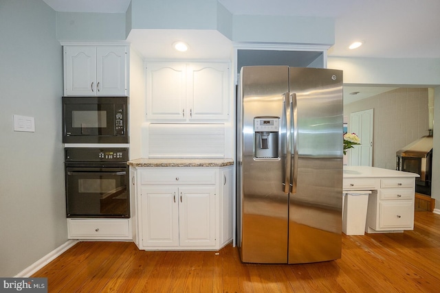 840 Old State Rd, Berwyn, PA 19312 - kitchen featuring black appliances, wood finished floors, white cabinetry, and recessed lighting