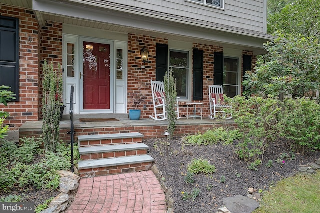 840 Old State Rd, Berwyn, PA 19312 - doorway to property featuring a porch and brick siding