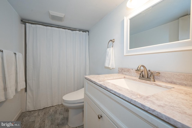 840 Old State Rd, Berwyn, PA 19312 - bathroom featuring vanity, wood finished floors, and a shower with curtain