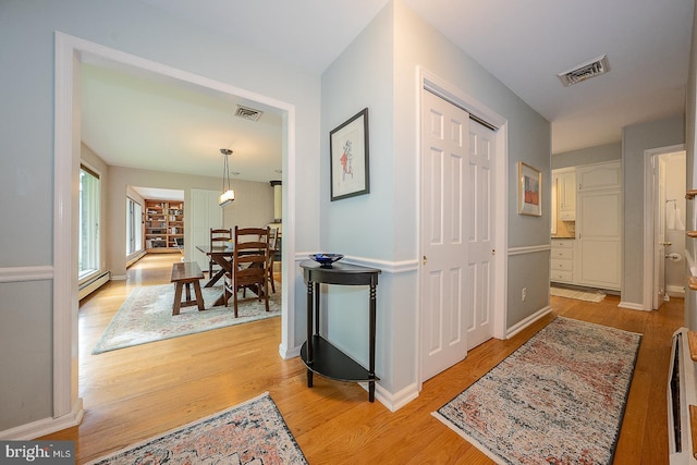 840 Old State Rd, Berwyn, PA 19312 - hall with a baseboard radiator and light wood-type flooring