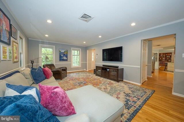 840 Old State Rd, Berwyn, PA 19312 - living area with wood finished floors, ornamental molding, and recessed lighting