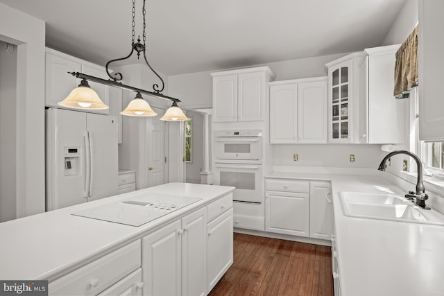 6 Shadybrook Rd, Mullica Hill, NJ 08062 - kitchen featuring white appliances, white cabinets, glass insert cabinets, and dark wood finished floors