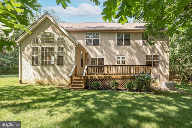 6 Shadybrook Rd, Mullica Hill, NJ 08062 - back of property featuring stucco siding, a wooden deck, and a lawn