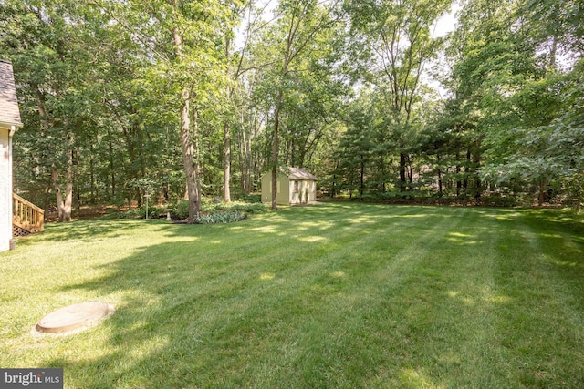 6 Shadybrook Rd, Mullica Hill, NJ 08062 - view of green lawn with a storage shed and stairway