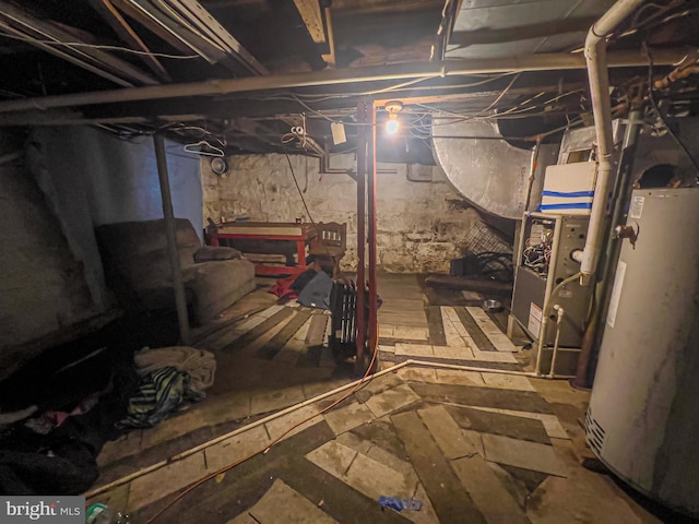 430 Bayard St, Kane, PA 16735 - unfinished basement featuring gas water heater