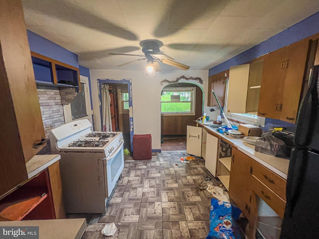 430 Bayard St, Kane, PA 16735 - kitchen featuring white gas range, freestanding refrigerator, ceiling fan, light countertops, and open shelves