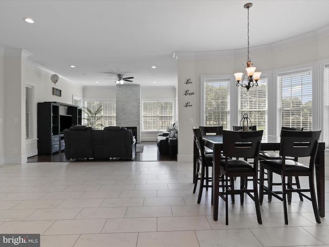 11509 Asbury Ridge Ct, Nokesville, VA 20181 - dining space featuring a chandelier, crown molding, a ceiling fan, and recessed lighting