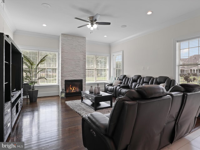 11509 Asbury Ridge Ct, Nokesville, VA 20181 - living room with ceiling fan, crown molding, a stone fireplace, wood finished floors, and recessed lighting