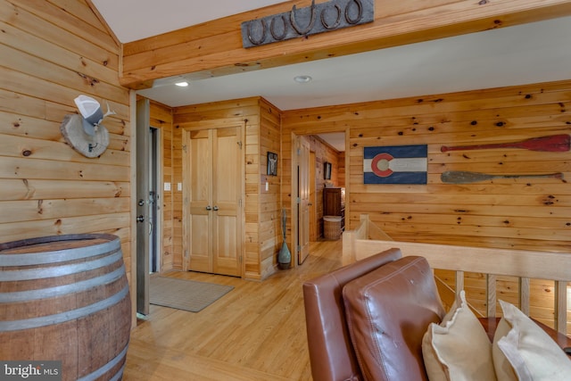 379 Wintergreen Way, Berkeley Springs, WV 25411 - living room with wooden walls, light wood finished floors, recessed lighting, and lofted ceiling