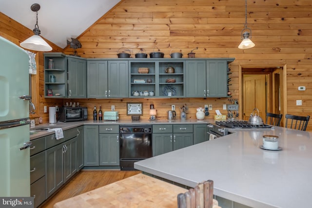 379 Wintergreen Way, Berkeley Springs, WV 25411 - kitchen featuring open shelves, wooden walls, vaulted ceiling, black appliances, and light wood finished floors