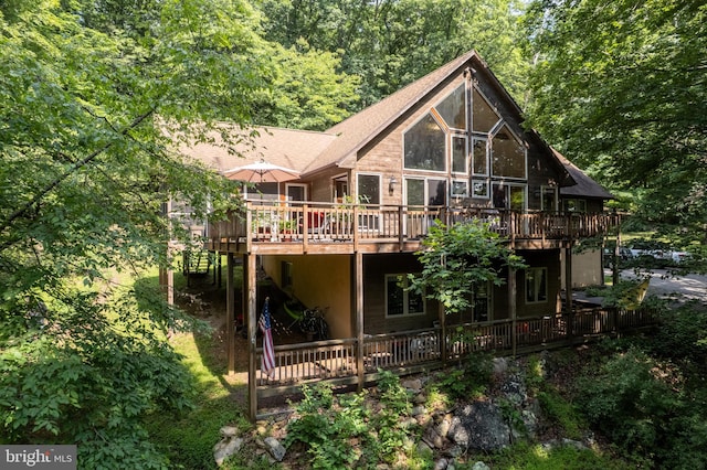379 Wintergreen Way, Berkeley Springs, WV 25411 - rear view of property featuring a deck and a shingled roof