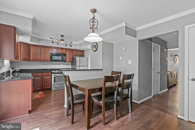 701 Hunters Run, Perkasie, PA 18944 - dining area featuring dark wood finished floors and ornamental molding