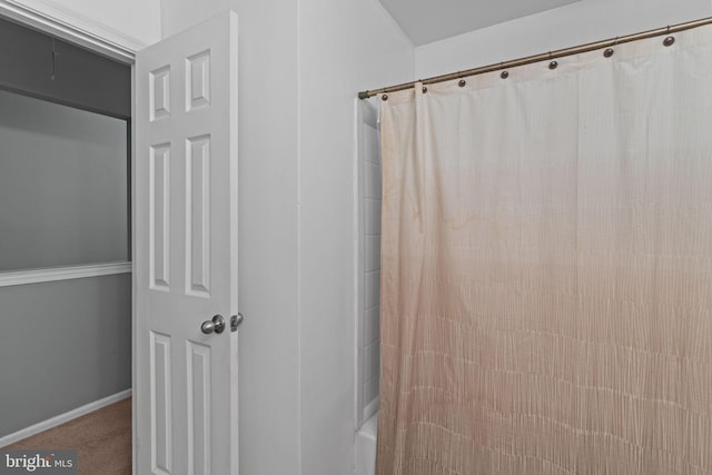 701 Hunters Run, Perkasie, PA 18944 - bathroom featuring shower / bathtub combination with curtain and baseboards
