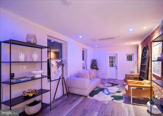 5717 Larchwood Ave, Philadelphia, PA 19143 - living room featuring wood finished floors, crown molding, and recessed lighting