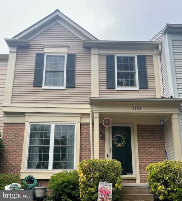 11182 Soldiers Ct, Manassas, VA 20109 - view of front facade with brick siding