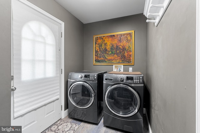 2397 Hill Rd, Perkiomenville, PA 18074 - washroom with separate washer and dryer and light wood-style flooring