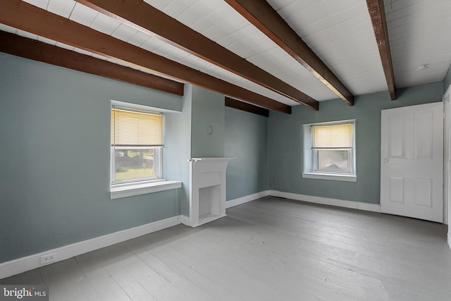 2397 Hill Rd, Perkiomenville, PA 18074 - unfurnished living room featuring beamed ceiling and wood finished floors