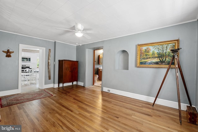 2397 Hill Rd, Perkiomenville, PA 18074 - empty room featuring light wood-style flooring, ceiling fan, and ornamental molding