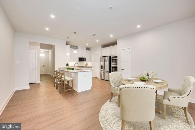 237 Hidden Acres Ln, Moorestown, NJ 08057 - dining room featuring light wood-style flooring and recessed lighting