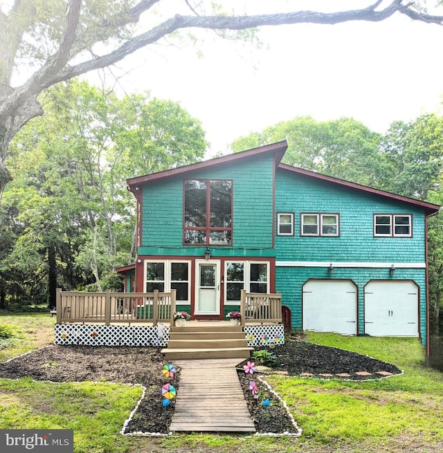 99 Old Main Shore Rd, Barnegat, NJ 08005 - view of front of property with an attached garage, a wooden deck, and a front lawn