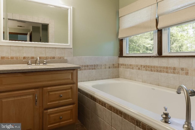99 Old Main Shore Rd, Barnegat, NJ 08005 - bathroom with healthy amount of natural light, a garden tub, and vanity