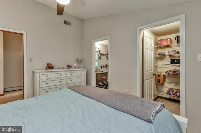 99 Old Main Shore Rd, Barnegat, NJ 08005 - carpeted bedroom featuring a baseboard radiator, a walk in closet, and a closet