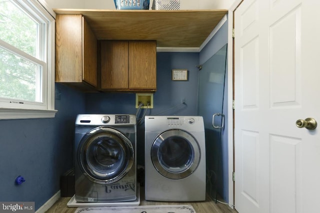 99 Old Main Shore Rd, Barnegat, NJ 08005 - laundry area featuring cabinet space, independent washer and dryer, and wood finished floors