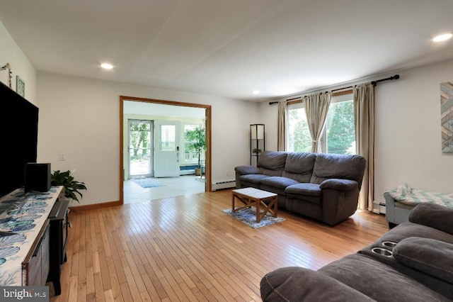99 Old Main Shore Rd, Barnegat, NJ 08005 - living room featuring baseboard heating, light wood-style flooring, healthy amount of natural light, and recessed lighting