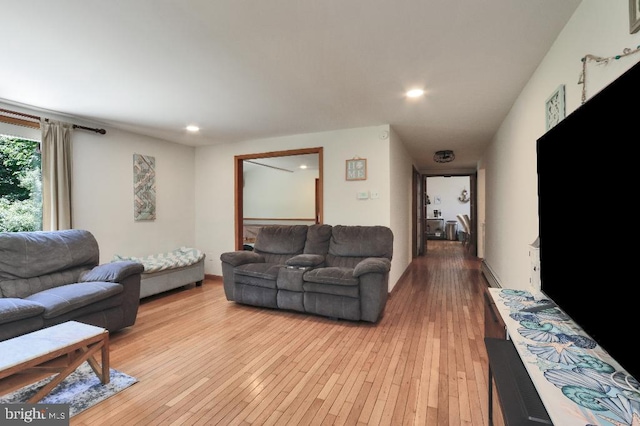 99 Old Main Shore Rd, Barnegat, NJ 08005 - living area with light wood-style floors, recessed lighting, and a baseboard radiator