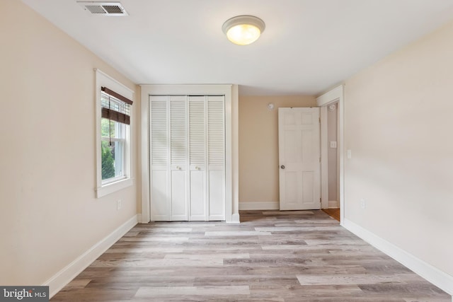 122 Carver Ave, Egg Harbor Township, NJ 08234 - unfurnished bedroom with light wood-type flooring and a closet