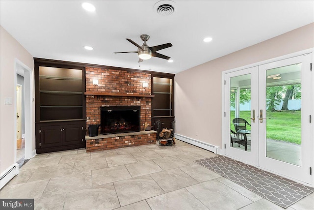 136 Schoolhouse Ln, Glen Mills, PA 19342 - unfurnished living room featuring a baseboard heating unit, ceiling fan, a brick fireplace, french doors, and recessed lighting