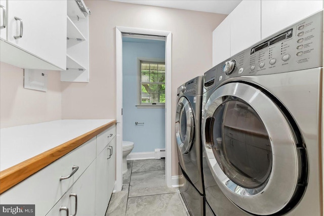 136 Schoolhouse Ln, Glen Mills, PA 19342 - washroom with independent washer and dryer, a baseboard radiator, and light marble finish floors