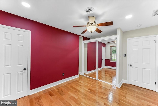 136 Schoolhouse Ln, Glen Mills, PA 19342 - unfurnished bedroom with wood finished floors, recessed lighting, a ceiling fan, and a closet