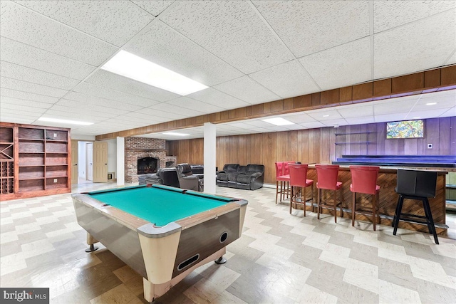 136 Schoolhouse Ln, Glen Mills, PA 19342 - recreation room featuring a paneled ceiling, billiards table, tile patterned floors, a dry bar, and wood walls