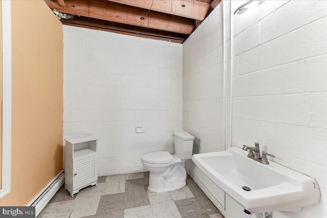 136 Schoolhouse Ln, Glen Mills, PA 19342 - half bath featuring a baseboard radiator and tile patterned floors
