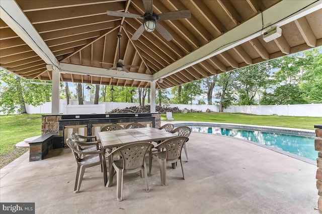 136 Schoolhouse Ln, Glen Mills, PA 19342 - fenced backyard featuring ceiling fan, a patio, and outdoor dining area