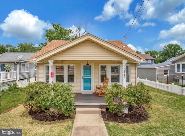 3816 Chesapeake Beach Rd, Chesapeake Beach, MD 20732 - view of front of home featuring a porch and roof with shingles