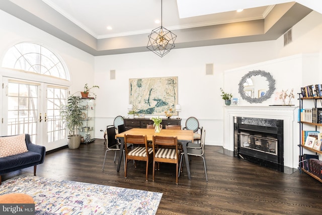216 Christian St Unit E, Philadelphia, PA 19147 - dining space with dark wood-style flooring, ornamental molding, a premium fireplace, recessed lighting, and a tray ceiling